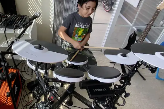 Student at the drums at Stars Music School, Inwood WV