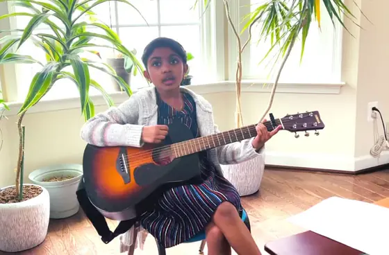 Student at the guitar at Stars Music School, Inwood WV