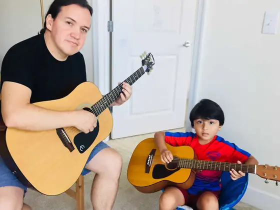 Guitar lesson with a young student at Stars Music School, Inwood WV